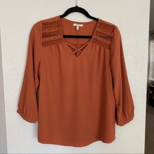 Burnt orange blouse with lace